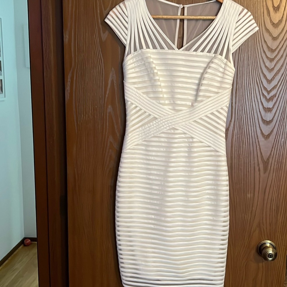Like new cocktail dress. Great for parties and holiday.